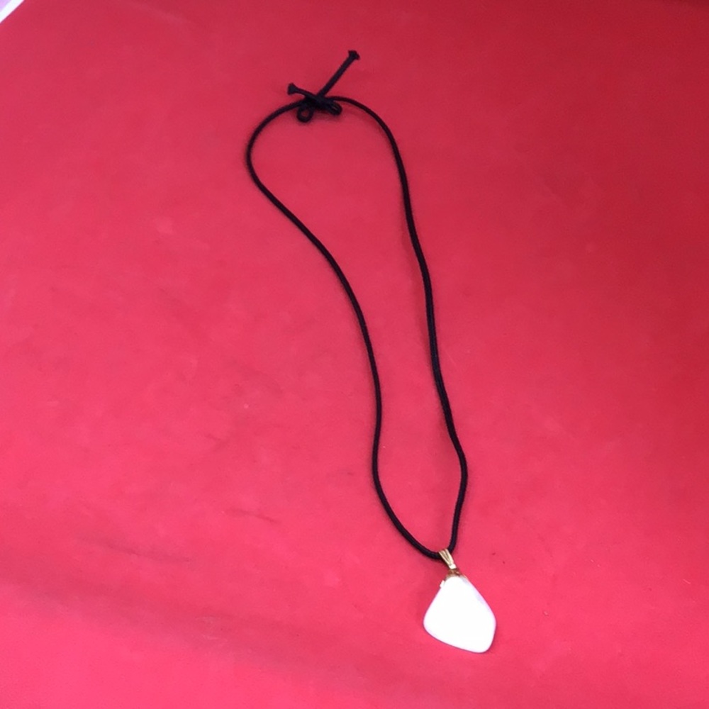 Acrylic Necklace Holding Marble Like Stone